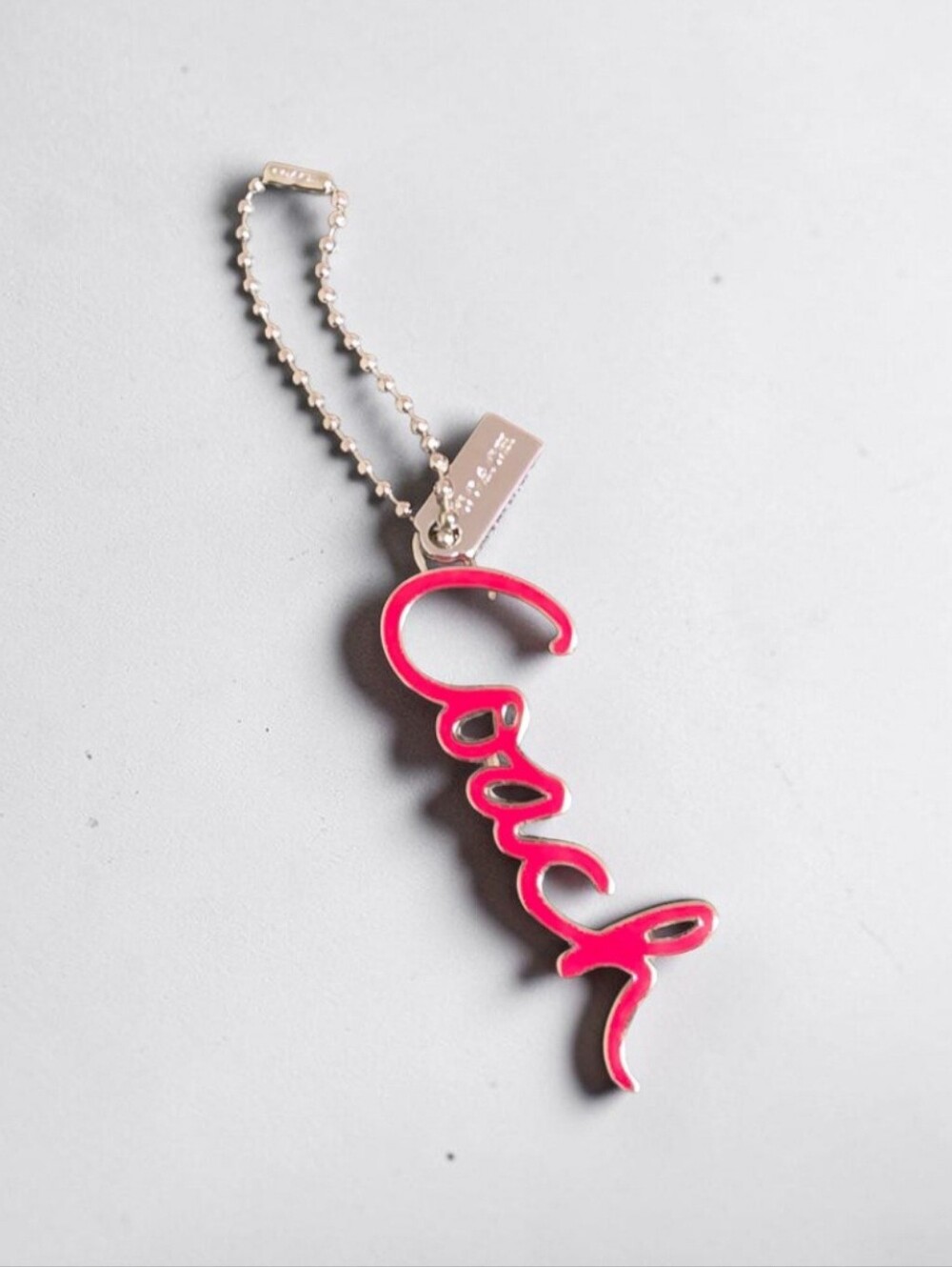 Coach Pink Script Logo Key Holder with Silver Tone Chain